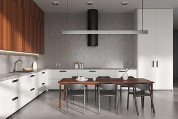 Side view on bright kitchen room interior with dining table