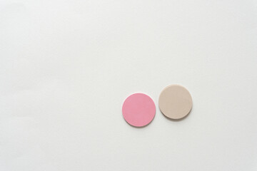 two paper circles isolated on blank paper