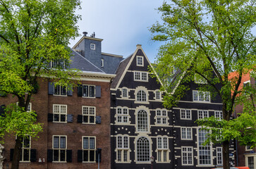 Fototapeta na wymiar Architecture in the historical center of Amsterdam, the Netherlands
