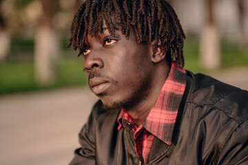 The Urban Rasta: A Portrait of a Young African Model with Natural Dreadlocks