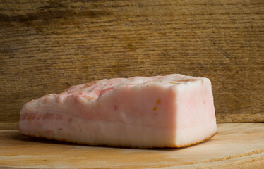 a piece of lard on a wooden board