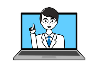 白衣を着た若い男性医師がパソコンでオンライン診療をしている