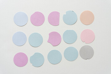 array of paper circles on blank paper