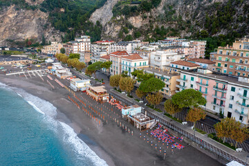 Fototapeta premium Aerial View of Maiori as the Ubrellas and Chairs are being set up in the morning Amalfi Coast Italy