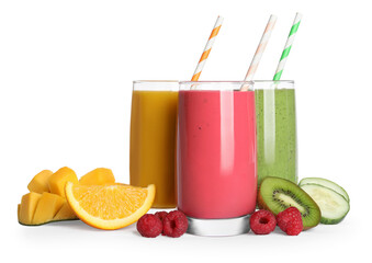 Glasses with delicious smoothies and ingredients on white background