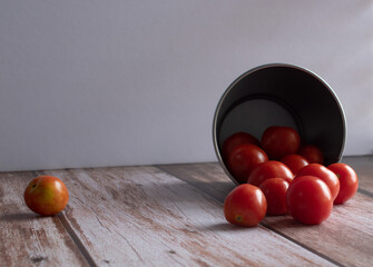 Tomatoes on wooden table