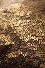 Beautiful golden sequin fabric as background, closeup