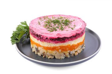 Herring under fur coat salad isolated on white. Traditional Russian dish