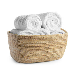 Wicker laundry basket with clean towels isolated on white