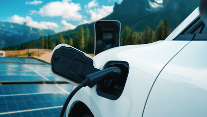 Concept of progressive future renewable and clean energy technology by charging station recharge EV...
