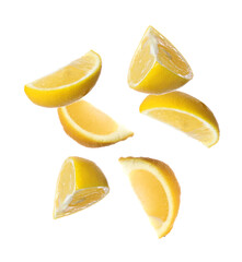 Fresh ripe lemon slices falling on white background