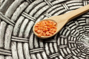 pink lentils in handmade plate