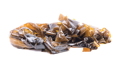 Fresh brown seaweed wakame isolated on  white background. Japanese healthy food