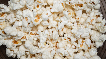closeup popcorn background. Caramel sweet corn. Cinema snack.