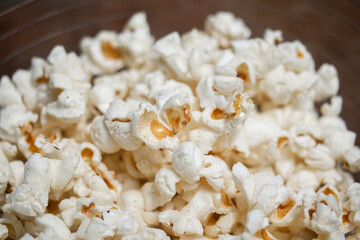 closeup popcorn background. Caramel sweet corn. Cinema snack.