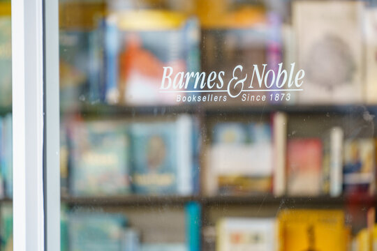 Photo of Barnes and Noble blur through window showing business logo