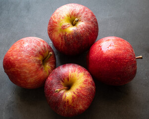 red apples on a black background 