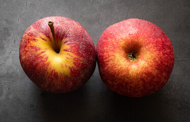 red apples on a black background