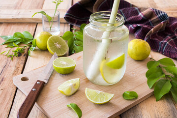 herbal cold drink lemon for health care arrangement flat lay style on background wooden