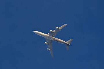 Jet airplane in the blue sky