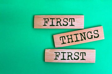 Wooden blocks with words 'First Things First'