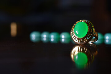 jade jewelry; jade stone; jade; green jade; gemstone; leaves; water; white; nature; green