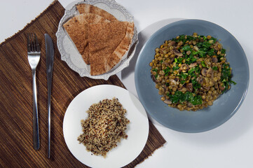 Raw ingredients. Ready to be cooked. Recipe for chicken stew, European cuisine, cooked with a garnish of mushrooms, small onions and other.