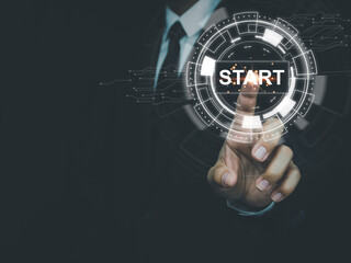 Businessman touching the start button on the digital virtual window