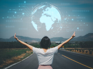 Fototapeta na wymiar Global network connection in human hand Woman raising her hand showing the connection of technology from around the world energy saving