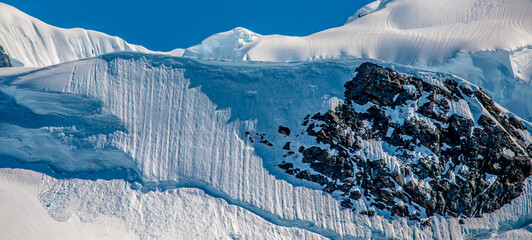 Mountains with blue this glaciers and ice
