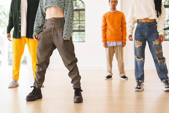 Image of diverse female and male hip hop dancers during training in dance club