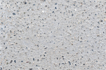 Gray and white concrete mixed with small gravel stones floor texture background.