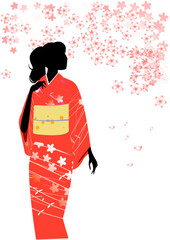 着た女性のシルエットと桜の花