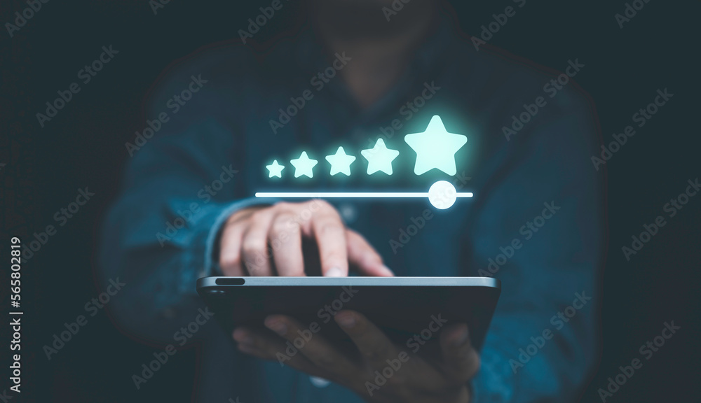Poster businessman using tablet to review and give excellent rating from evaluation survey after use produc