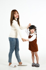 happy family asian mother and child daughter on white background.