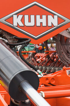 Bednary, Poland - September 25, 2021: Agroshow. Piston or actuator in red machine with Kuhn logo. Manufacturer of agricultural equipment