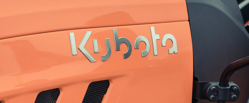 Bednary, Poland - September 25, 2021: Agroshow. Front of tractor with Kubota logo. Manufacturer of agricultural equipment