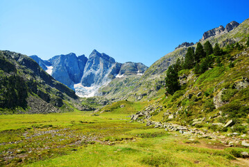 Fototapeta na wymiar Mountain landscape. Vignemale massif in the department of Hautes-Pyrenees, Occitanie, France.