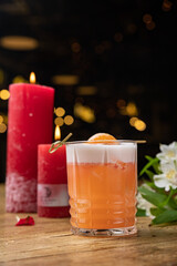 the bartender prepares a delicious alcoholic cocktail	