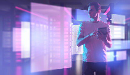 Man system administrator. Guy with tablet on neon background. Panels symbolizing digitalization...
