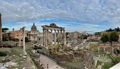 Naklejka na ściany i meble The Roman Forum, or Latin name Forum Romanum (Italian: Foro Romano), is a rectangular forum (plaza) surrounded by the ruins of several important ancient government buildings at the center 