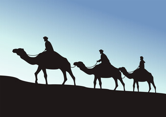 camel caravan going through the desert on beautiful blue sky