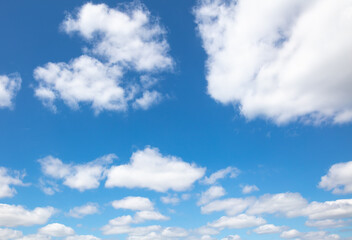 Obraz na płótnie Canvas White clouds on the blue sky