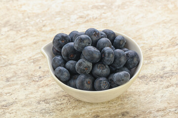 Sweet ripe blueberry heap in the bowl
