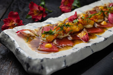 delicious tuna dish on a plate prepared in a restaurant.

