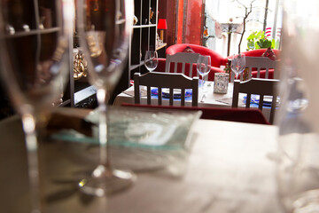 Elegant restaurant table with cutlery, crockery and glasses.