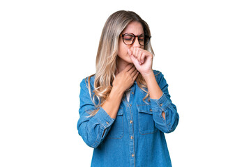 Young Uruguayan woman over isolated background coughing a lot