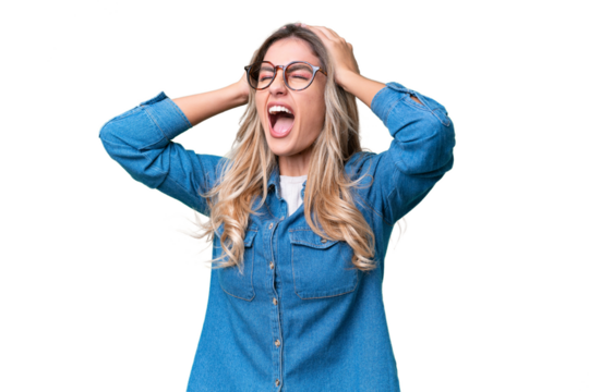 Young Uruguayan woman over isolated background stressed overwhelmed