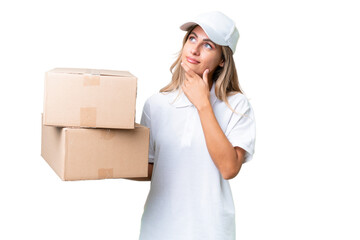 Delivery Uruguayan woman over isolated background having doubts