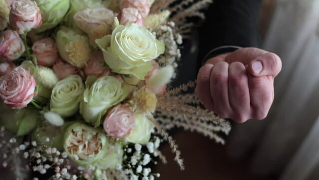 Beautiful wedding bouquet. Festive flowers, white roses. Wedding decor